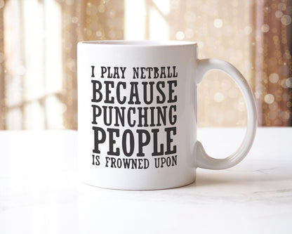 Funny Netball Mug: "I Play Netball Because Punching People Is Frowned Upon"